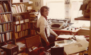 Paul at his first office at home.